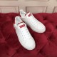 Dolce & Gabbana Portofino Trainers Pair View in white and red Overhead pair view of Dolce & Gabbana white leather trainers with red stitched outlines