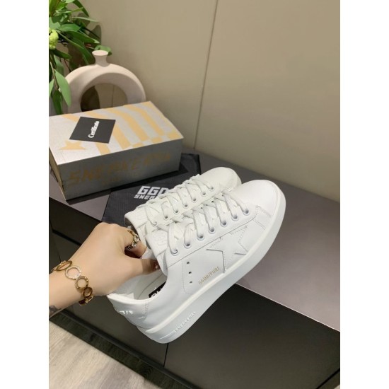 Top side view of Golden Goose Purestar white leather trainers with laces and star overlay