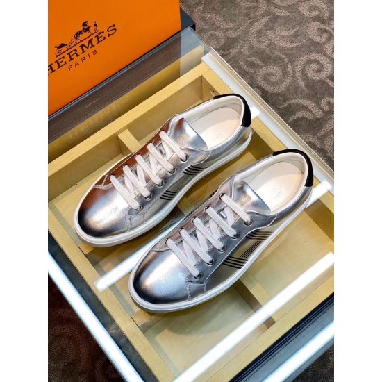 Hermes Avantage Metallic Silver Trainers Overhead Pair View Pair of metallic silver Hermes low top trainers displayed together from above