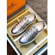 Hermes Avantage Metallic Silver Trainers Overhead Pair View Pair of metallic silver Hermes low top trainers displayed together from above