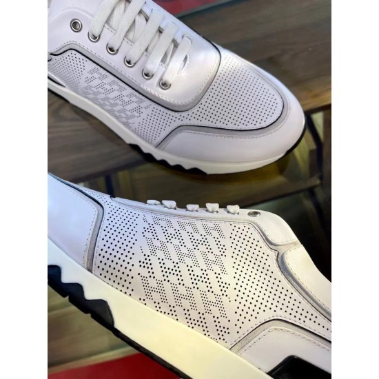 Hermes Addict White Trainer Perforated Leather Close-Up Detail Close-up of the micro-perforated leather side panel and lace closure on the white Hermes Addict trainer