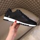 Hermes Trail low top black leather trainer outer side view in black and white