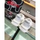 Rear view showing white heel cups and Odissea logo lettering