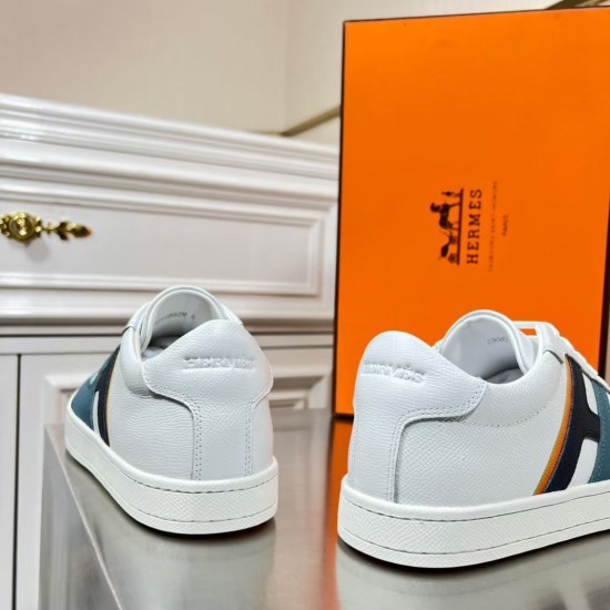 Rear view showing white leather heels of Hermes Boomerang trainers in white and blue
