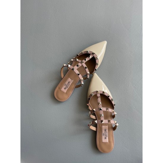 Replica Valentino Rockstud Flat Mules In White Patent Leather UK replica Valentino Rockstud Flat Mules In White Patent Leather UK