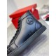 Christian Louboutin Men's Black Spiked High-Top Sneakers Emblem Detail Close-up of side emblem on Christian Louboutin Men's Black Leather Spiked High-Top Sneakers