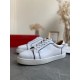 Three-quarter side angle of Christian Louboutin Vieirissima white leather trainers in white and black