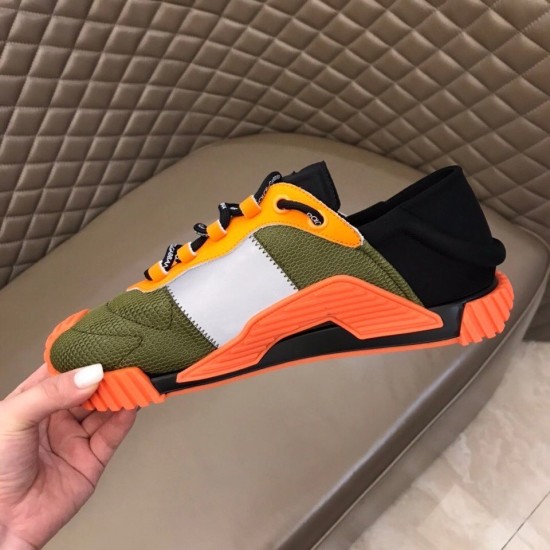 Dolce & Gabbana Trainer Handheld Medial View in green and orange Handheld medial side view of green and orange low top trainer