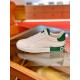 Dolce & Gabbana Portofino White Trainer Lateral View in white and green Side view of white leather Portofino trainer with red stitching and green heel logo panel