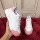 Dolce & Gabbana Portofino White Leather Trainers Handheld View in white and pink Dolce & Gabbana Portofino white leather trainers held up with pink toe-cap