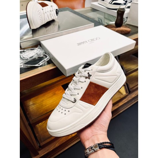 Jimmy Choo Leather Low Top Trainers White Brown Handheld View Jimmy Choo Leather Low Top Trainers White Brown held hand side view