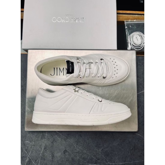 Jimmy Choo Hawaii White Trainers Pair Display Pair of Jimmy Choo Hawaii white trainers displayed side-by-side on metal tray