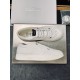 Jimmy Choo Hawaii White Trainers Pair Display Pair of Jimmy Choo Hawaii white trainers displayed side-by-side on metal tray