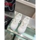 Top-down view showing tongues and Medusa details on white Versace trainers