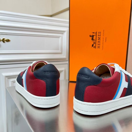 Rear view showing navy leather heel tabs on Hermes Boomerang trainers in multicolour