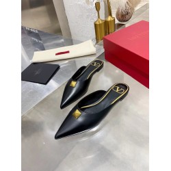Valentino Roman Stud Flat Mules In Black Calfskin Uk
