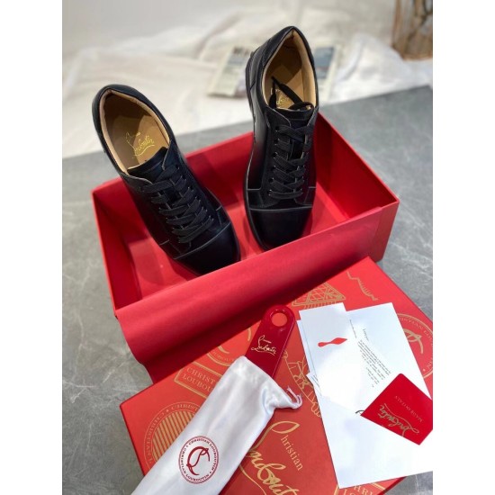 Christian Louboutin Louis Junior Flat Black Leather Trainers in Box Top-down view of Christian Louboutin Louis Junior Flat black leather low top trainers inside a branded red shoebox
