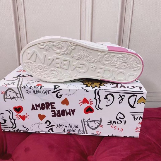 Dolce & Gabbana Custom 2.Zero Trainer Patterned Sole in white and pink Underside view of white and pink Dolce & Gabbana trainer sole rested on printed shoe box