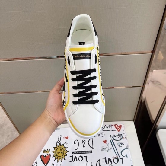 Dolce & Gabbana Portofino Printed White And Yellow Leather Trainer Top View Dolce & Gabbana Portofino Printed White And Yellow Leather Trainer top-down view showing lacing