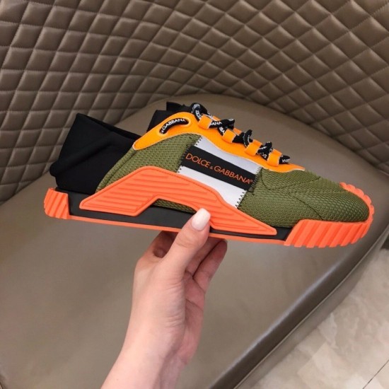 Dolce & Gabbana Trainer Handheld Lateral View in green and orange Handheld profile shot showing lateral panel of green mesh trainer in green and orange