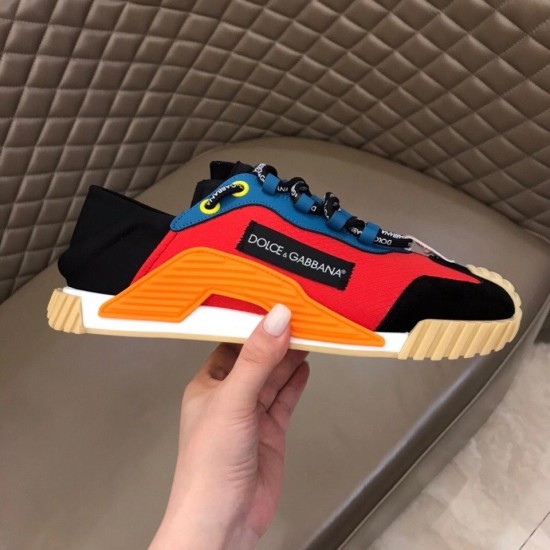 Dolce & Gabbana Red Mesh Trainer Lateral Side Hand holding single Dolce & Gabbana red mesh trainer showcasing the side branding