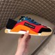 Dolce & Gabbana Red Mesh Trainer Lateral Side Hand holding single Dolce & Gabbana red mesh trainer showcasing the side branding