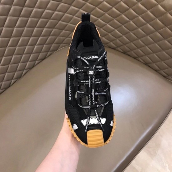 Top down view of Dolce & Gabbana black fabric trainer showcasing branded laces in black and tan