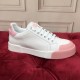 Dolce & Gabbana Portofino White Leather Trainers Side Profile in white and pink Dolce & Gabbana Portofino white leather trainers side profile view on red velvet in white and pink