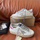 Both Golden Goose Hi Star white leather trainers displayed with grey laces in white and silver