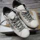 Golden Goose Super-Star Trainers with Box in white and grey Golden Goose Super-Star white trainers sitting on a branded shoebox in white and grey