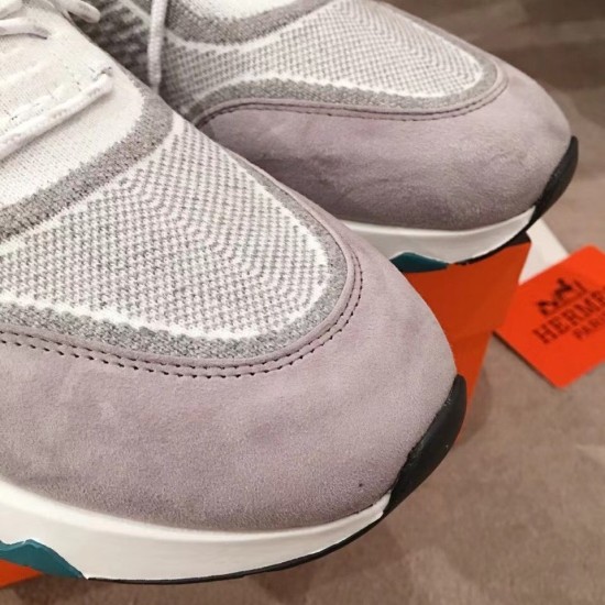 Detailed close-up of the grey suede toe cap on the Hermes knit trainer