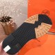 Hermes Addict Knit Trainers Rubber Outsole Tread in beige and white Close-up of the black and gum rubber tread outsole on Hermes Addict Knit Trainer in beige and white
