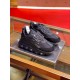 Versace Chain Reaction Black Trainers Front Profile Angled front view of Versace Chain Reaction black trainers pair