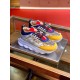 Versace Chain Reaction Baroque Print White Trainers Pair Angle View in white and yellow Pair of Versace Chain Reaction Baroque Print White Trainers displayed on a metallic pedestal in white and yellow