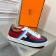 Profile view of the outer side of Hermes Boomerang multicolour leather trainer