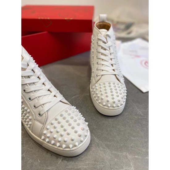 Christian Louboutin Louis Spikes Flat white leather spiked toe cap close-up