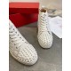 Christian Louboutin Louis Spikes Flat white leather spiked toe cap close-up