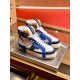Dolce & Gabbana Custom 2.Zero high-top blue colour-block trainers resting side-by-side on display stand in blue and white