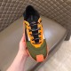 Dolce & Gabbana Trainer Top View in green and orange Top-down perspective of green and orange Dolce & Gabbana trainer