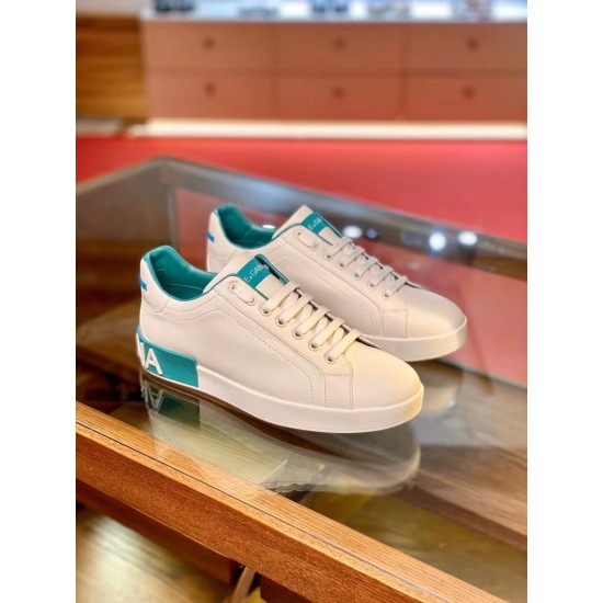 Dolce & Gabbana Portofino Trainers Pair Display in white and blue Pair of white and azure blue Dolce & Gabbana Portofino Trainers on display