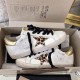 Golden Goose Super-Star Pair in Packaging in white and gold Both Golden Goose white leather trainers displayed together in open presentation box