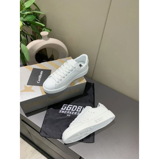 Golden Goose Purestar white leather trainers shown with shoe box and dust bag