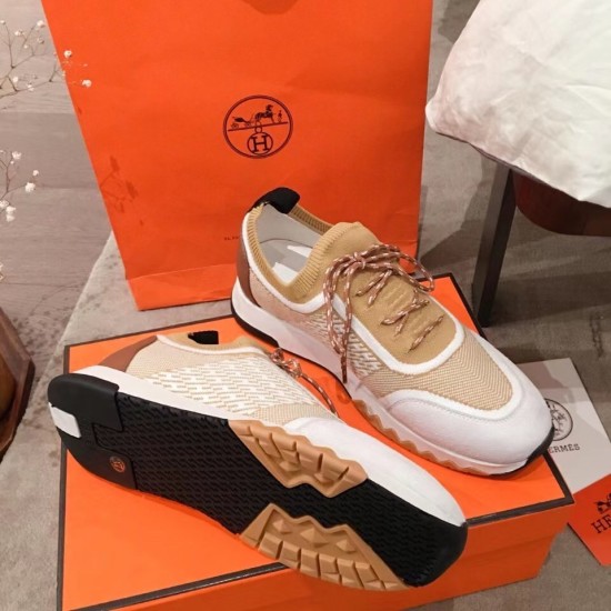 Hermes Addict Knit Trainers Pair with Sole View in beige and white Pair of Hermes Addict Knit Trainers displayed on box showing the upper and treaded sole in beige and white