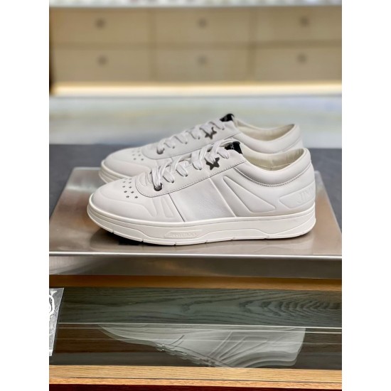 Jimmy Choo Hawaii White Trainer Side Profile Side profile of Jimmy Choo Hawaii white leather trainer on metal display platform