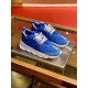 Versace Chain Reaction Blue Trainers Pair in blue and white Pair of blue Versace Chain Reaction mesh trainers angled on a glass surface in blue and white