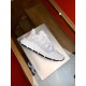 Versace Trigreca Low Top White Trainer Profile View in white and gold Side profile of single Versace Trigreca Low Top White Trainer resting on display stand in white and gold