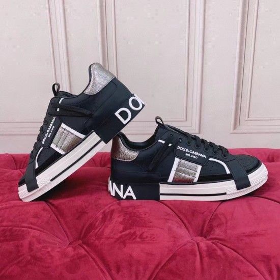Dolce & Gabbana Custom 2.Zero Both Shoes View in black and white Pair of black leather trainers showing outer and inner side panels in black and white