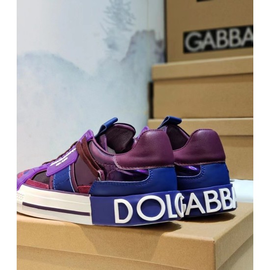 Dolce & Gabbana Purple Trainers Heel Detail Heel angle of Dolce & Gabbana trainers showing bold white lettering in purple