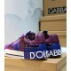 Dolce & Gabbana Purple Trainers Heel Detail Heel angle of Dolce & Gabbana trainers showing bold white lettering in purple