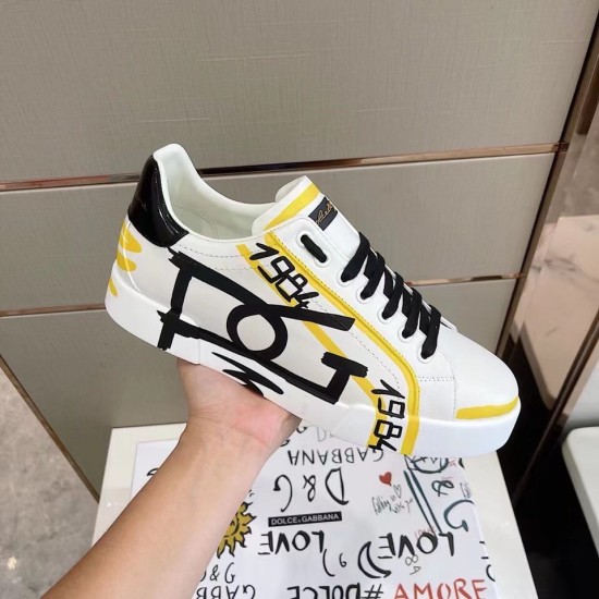 Dolce & Gabbana Portofino Printed White And Yellow Leather Trainer Lateral View Dolce & Gabbana Portofino Printed White And Yellow Leather Trainer lateral side detail view
